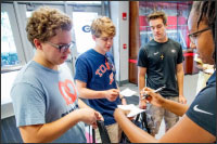 RSVP advocate talking with students